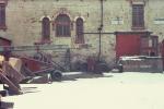 Site of old theatre in Dog Kennel Yard. Now a car park.