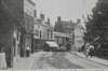 White Hart and Saracens Head.An old view showing both Inns with a cart of barrels outside the Saracens.