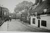 White Hart. Note the Fighting Cocks in the background. Also note the wooden railings by the river. The pub had one of the longest, although narrow, yards in the town and was used by carriers from villages to the west.In the 1840's the Inn had a bad reputation in the eyes of the local constabulary.