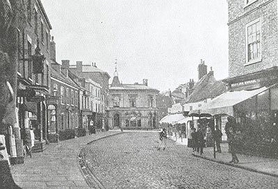 High Street, Horncastle.  Note the sunblinds and thatched roofs of the shops